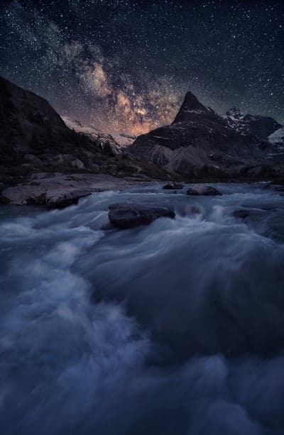 Galactic Night Sky Over Glacial Stream Phone Wallpaper