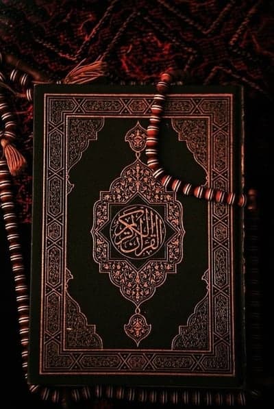 Elegant Quran with Prayer Beads and Islamic Decor