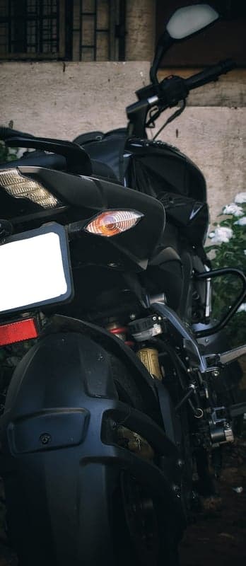 Black Motorcycle Tail Light with White License Plate