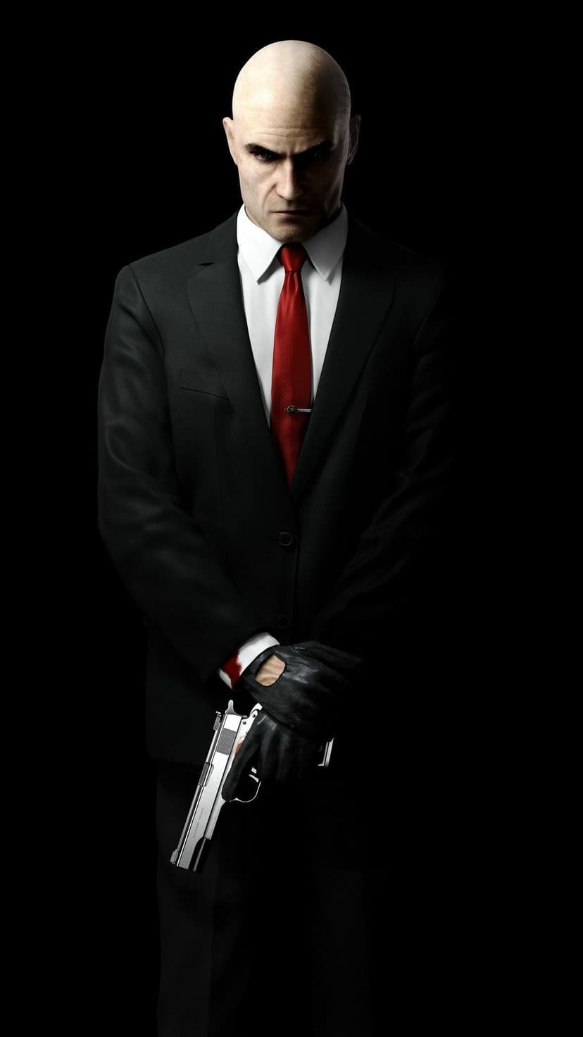 Agent 47 in a black suit and red tie holds a silver pistol against a black background in a vertical portrait.