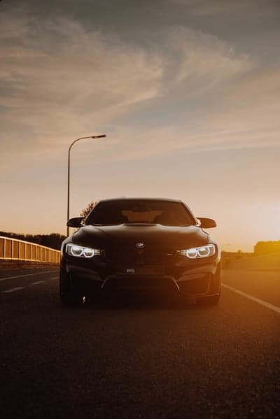 Black BMW M4 Performance Coupe Sunset Phone Wallpaper