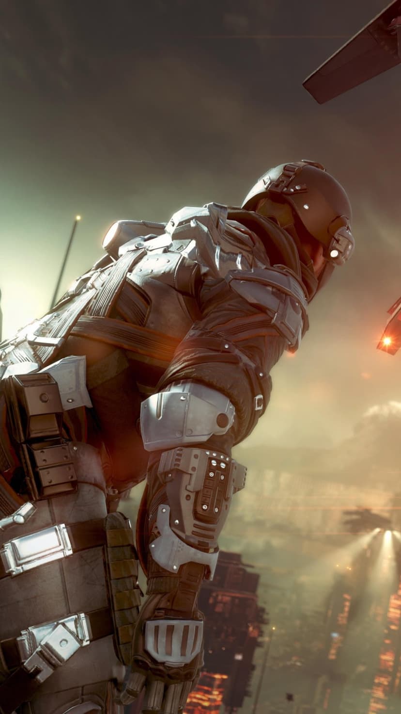 Futuristic soldier in heavy power armor stands against a hazy urban background with glowing orange highlights.