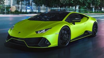 Vibrant Lime Green Lamborghini Huracán Evo Night Wallpaper