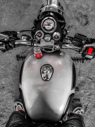 Minion Keychain on Classic Motorcycle Dashboard