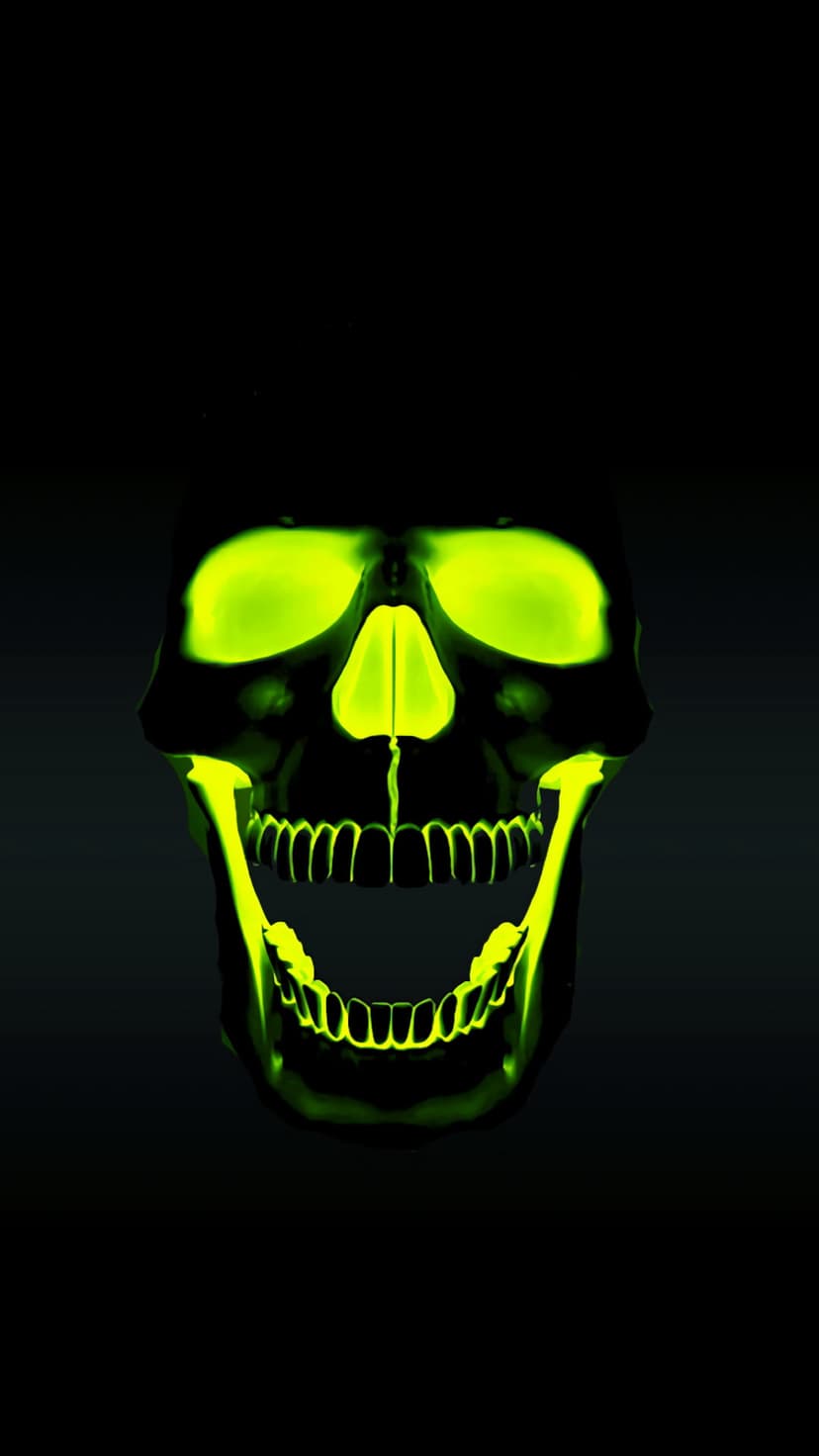 Glowing green skull with translucent bone textures and hollow eye sockets illuminated against a black background.