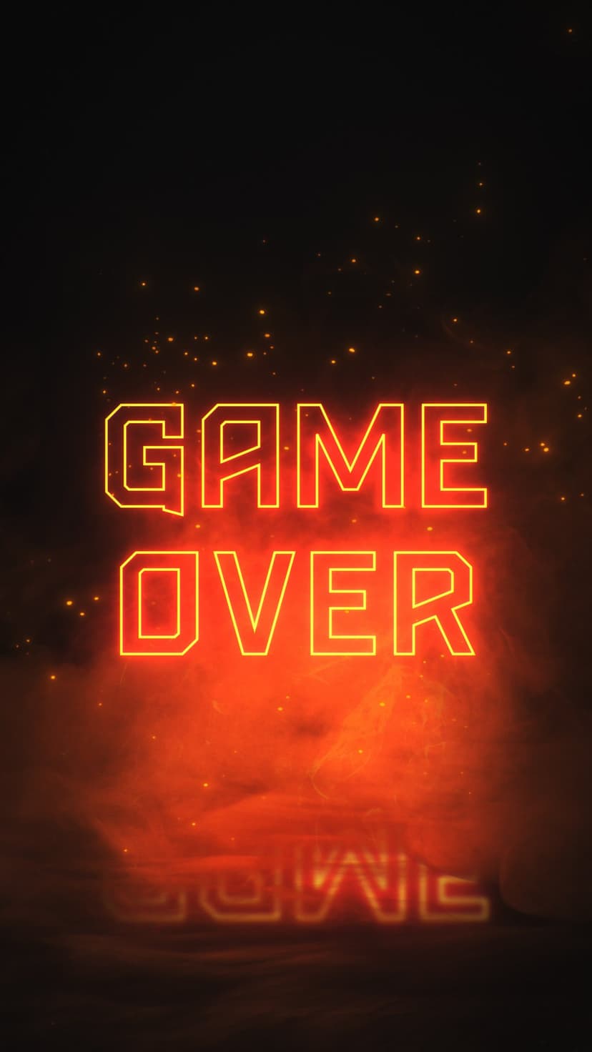 Glowing Game Over text in neon letters surrounded by orange sparks and rising smoke on a dark background.