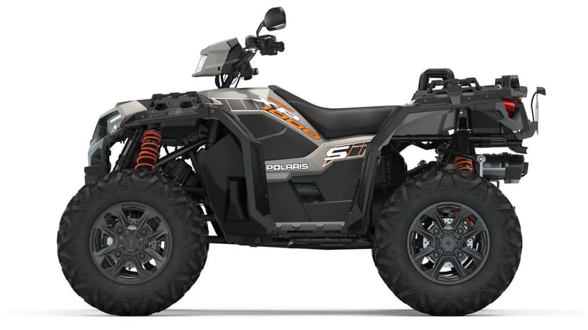 Side profile of a gray Polaris Sportsman 1000 S ATV with orange coil springs on a white background.