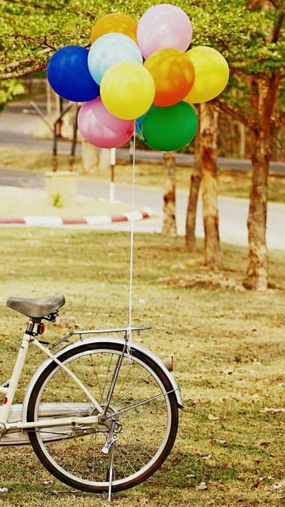 Bicycle with Colorful Balloons in Outdoor Setting