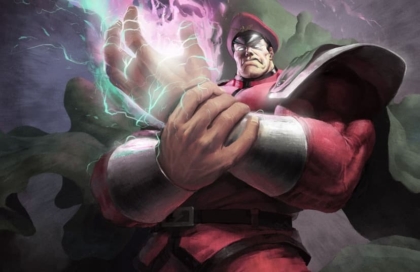 M. Bison in a red military uniform channels purple and green energy between his large silver metallic gauntlets.