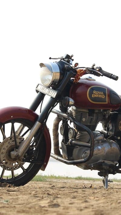 Royal Enfield Bullet Motorcycle on Sandy Ground