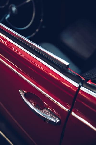 Vintage Red Sports Car Interior Handle Phone Wallpaper