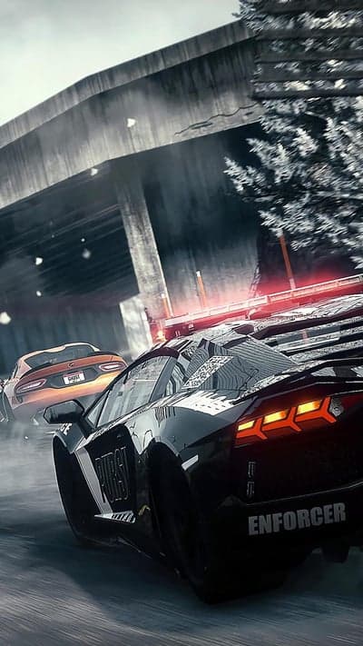 Police car chase under highway overpass in snowy conditions