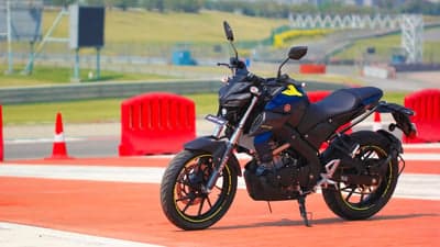 Blue Yamaha MT-15 Sport Bike on Racetrack Desktop Wallpaper