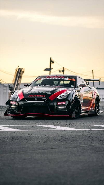 Aggressive Black Nissan GT-R with Red Accents