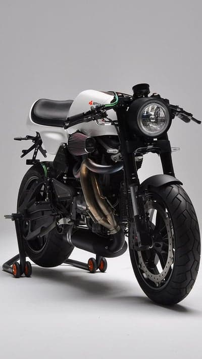 Custom White Cafe Racer Motorcycle on Stand