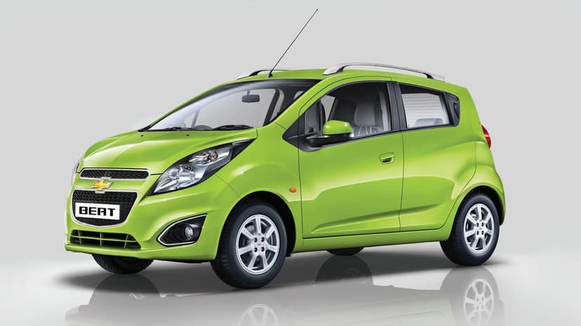 Lime green Chevrolet Beat hatchback parked on a reflective studio floor with bright lighting and silver accents.