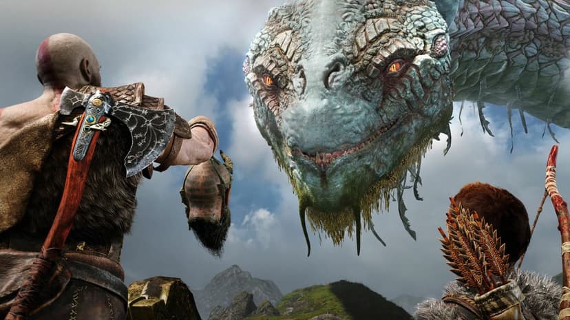 Kratos and Atreus look up at the giant World Serpent against a mountainous landscape and cloudy sky.