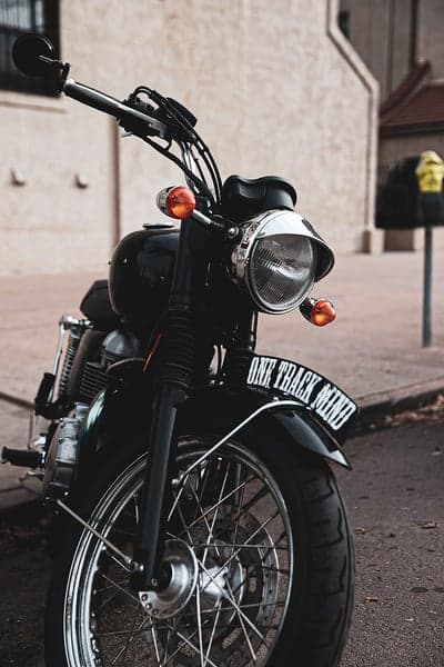 Classic Black Motorcycle with "One Track Mind" Plate