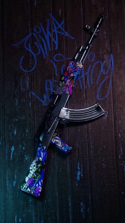 Graffiti AK-47 with vibrant pixel art skin