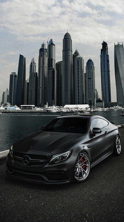 Matte Black Mercedes C63 AMG Coupe Dubai Skyline