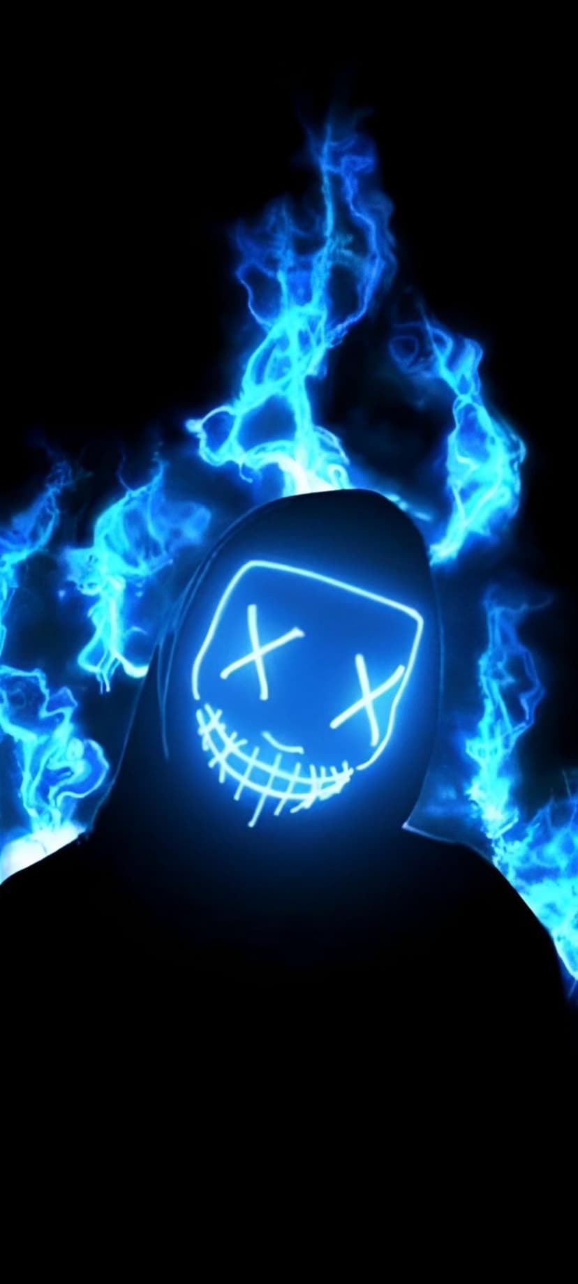 Glowing blue LED mask with X eyes and a stitched smile surrounded by ethereal flames against a black background.