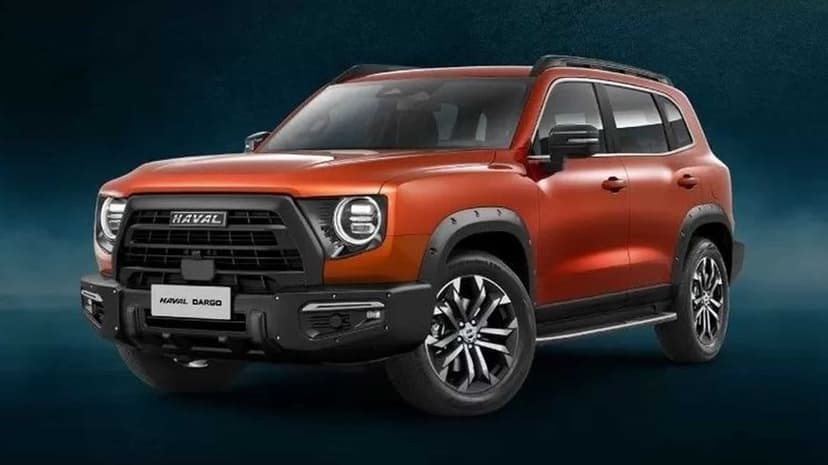 Orange Haval Dargo SUV with black off-road bumper and round headlights against a dark blue background.
