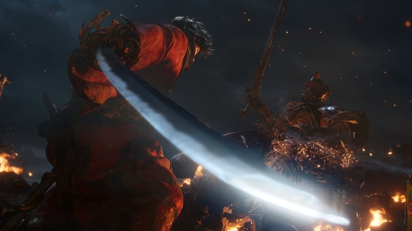 Armored warrior in red swings a glowing blade at an enemy amidst sparks and fire in a dark night scene.