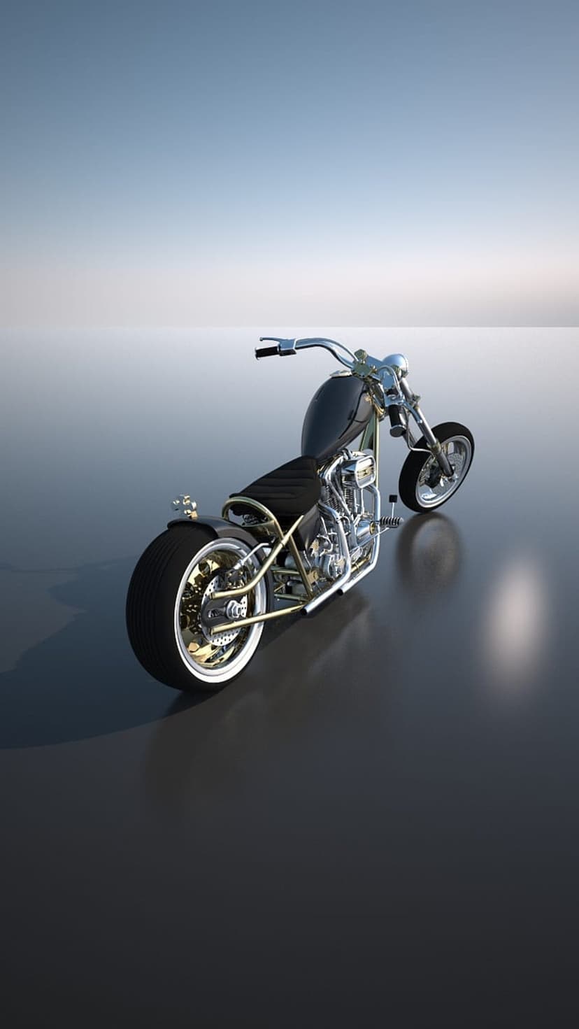 Black chopper motorcycle with chrome accents reflects on a dark surface under a soft gradient sky backdrop.