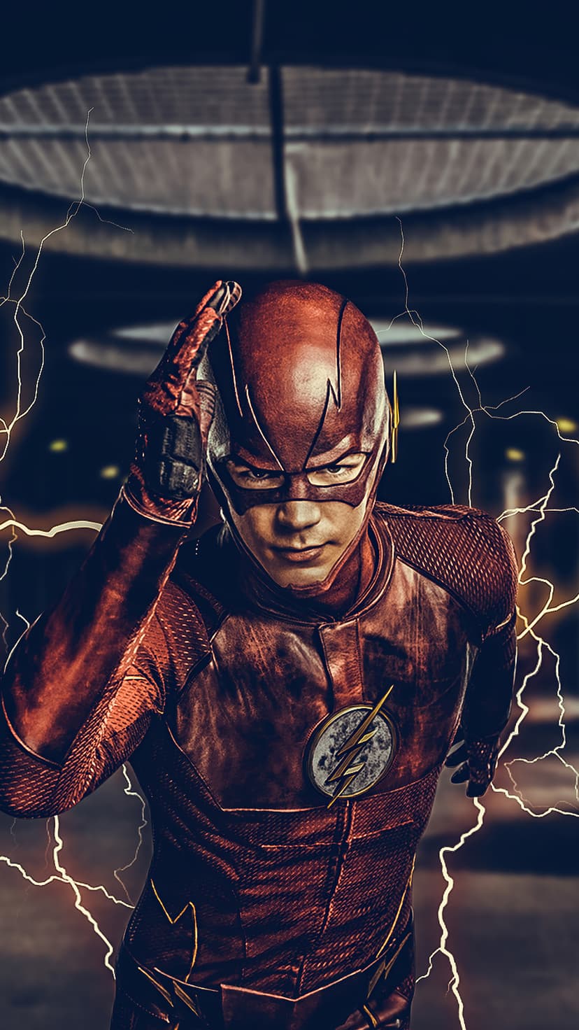 Barry Allen in a red superhero suit with sparks of yellow lightning in a dark industrial vertical portrait.