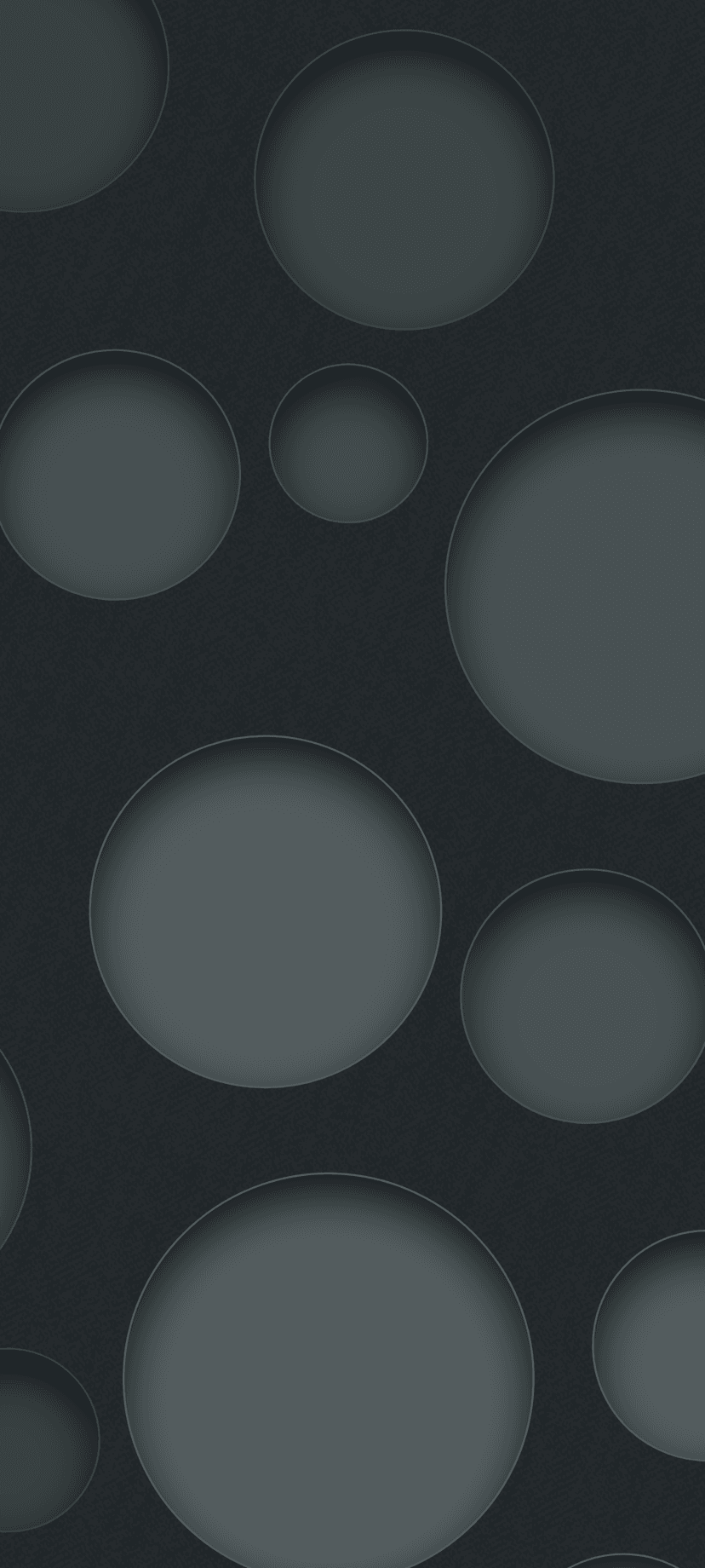 Overlapping dark gray circles with soft shadows rest on a grainy charcoal background with subtle depth.