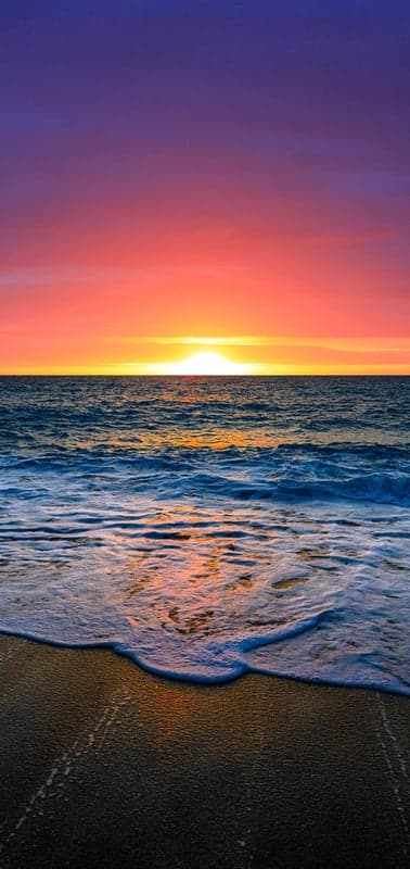 Tropical Horizon- Fiery Sunset Over Gentle Waves