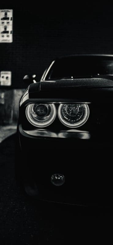 Black Dodge Charger Headlights at Night