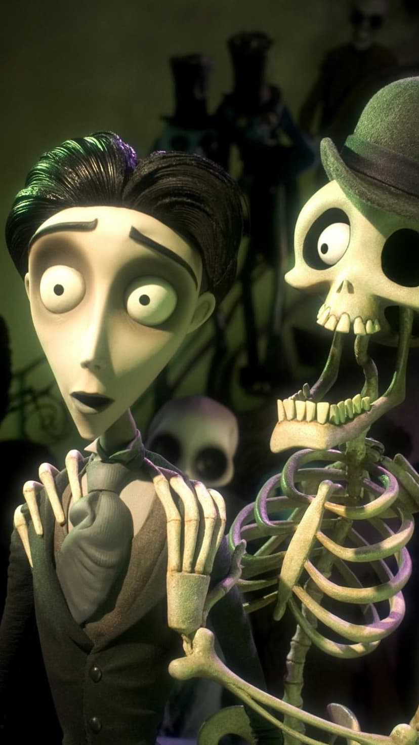 Victor Van Dort stares with wide eyes at a jovial skeleton wearing a hat with its jaw hanging wide open.