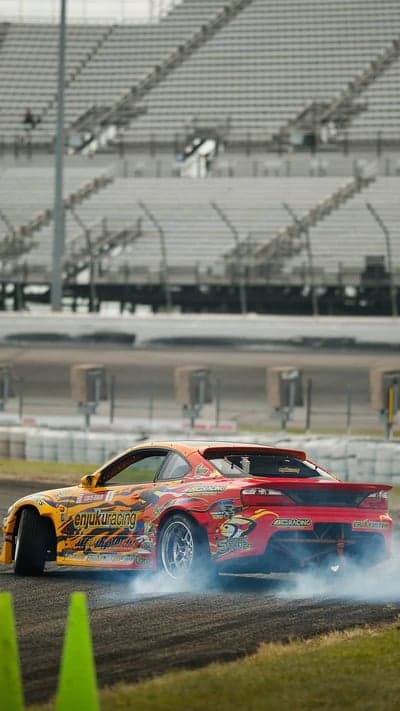 Orange Drift Car Racing Smoke Mobile Phone Wallpaper