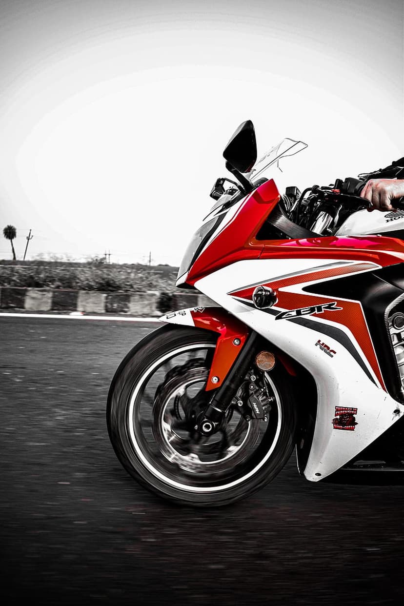 Dynamic Red and White Sportbike Racing Phone Wallpaper