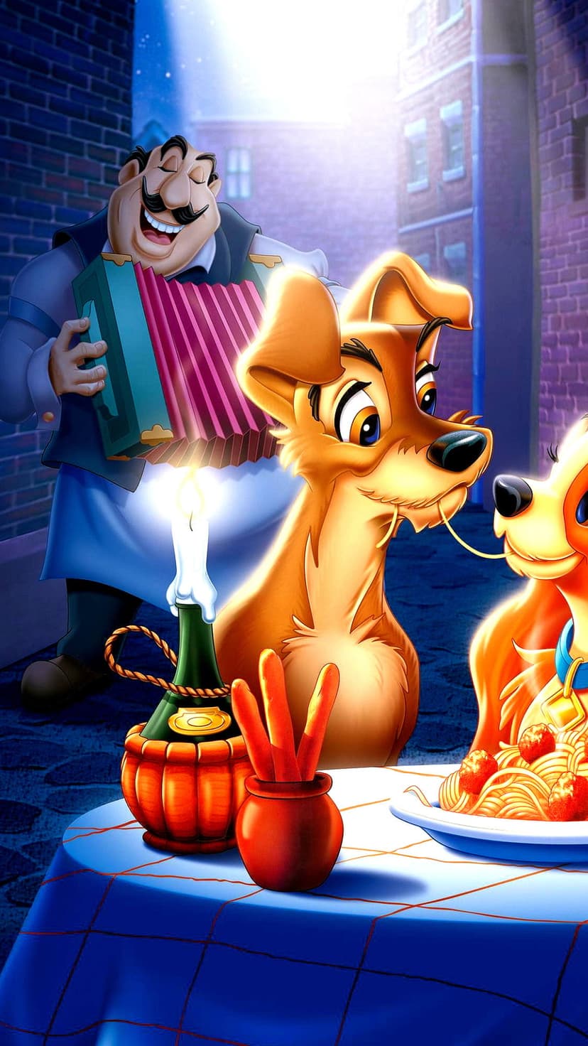 Lady and Tramp share spaghetti at a candlelit table while a musician plays accordion in a dark alleyway.