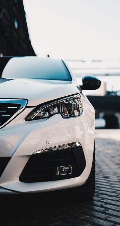 Close-up of a White Peugeot 308 Car Front
