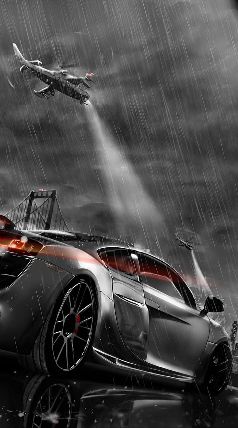 Luxury sports car on a wet city street at night under a helicopter spotlight with glowing skyscrapers behind.