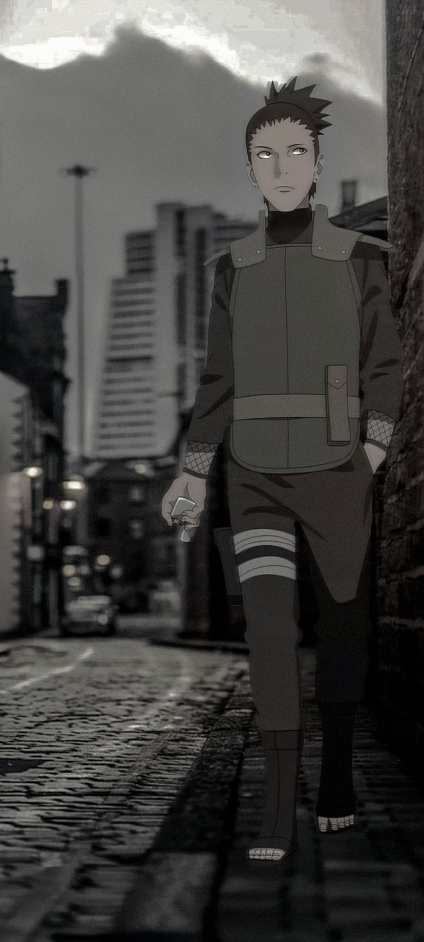 Shikamaru Nara walks down a dark cobblestone street past blurred city buildings in a monochrome urban scene.