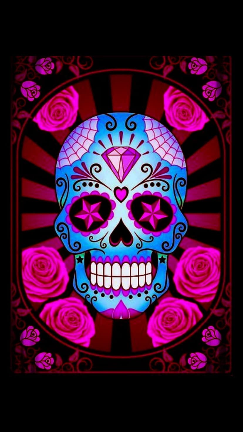 Sugar skull with pink star eyes, a forehead diamond, and roses against a red and black striped oval background.