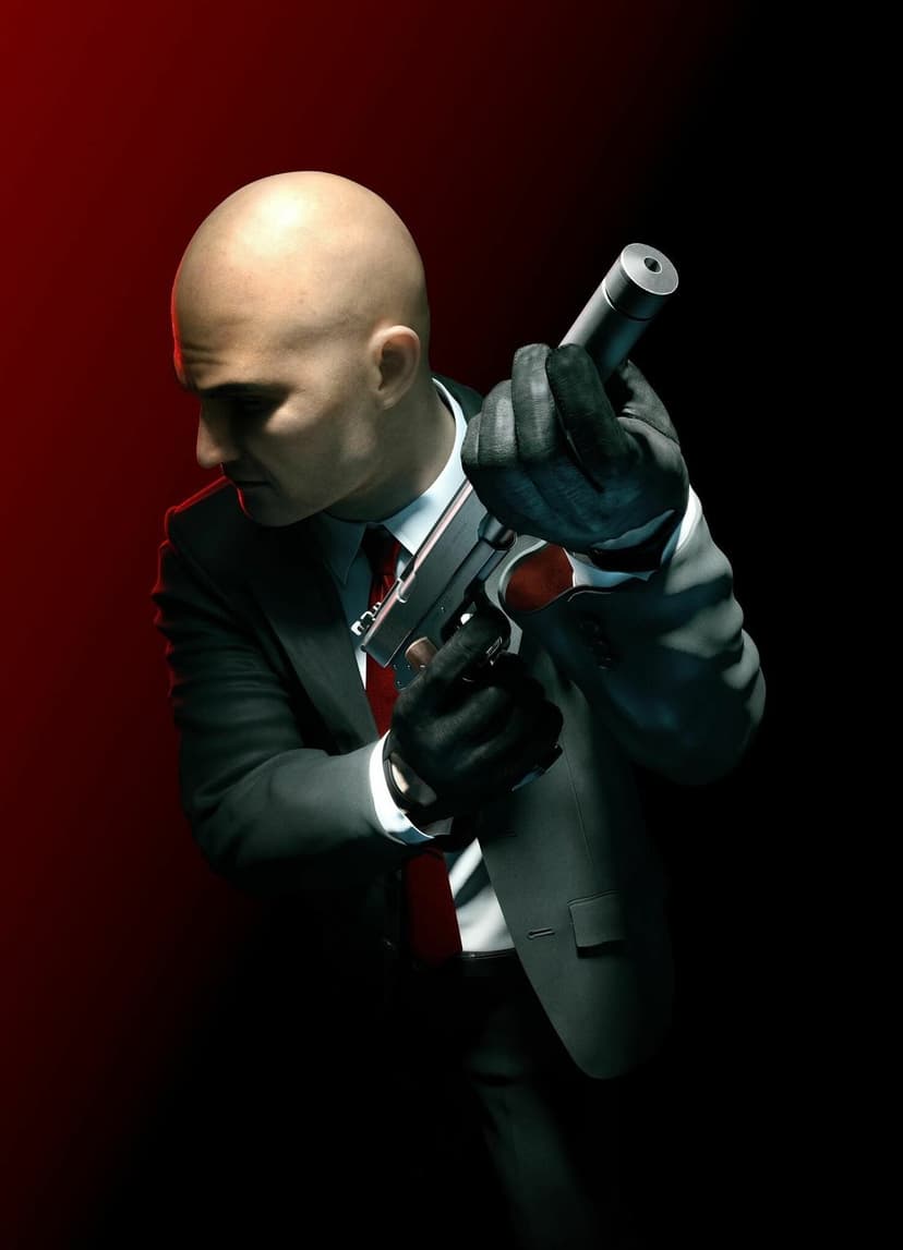 Bald man in a suit and red tie attaches a silencer to a silver pistol against a red and black background.