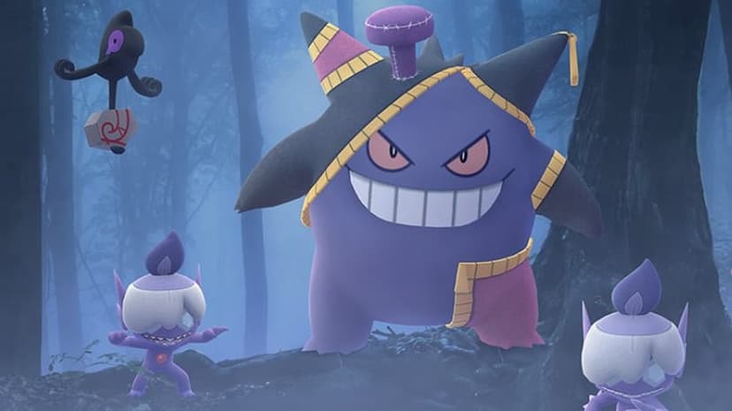 Gengar in a Mega Banette costume stands in a foggy blue forest with floating Yamask and Litwick companions.