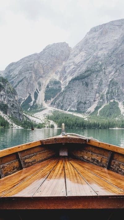 Misty Mountain Lake and Rowboat Phone Wallpaper