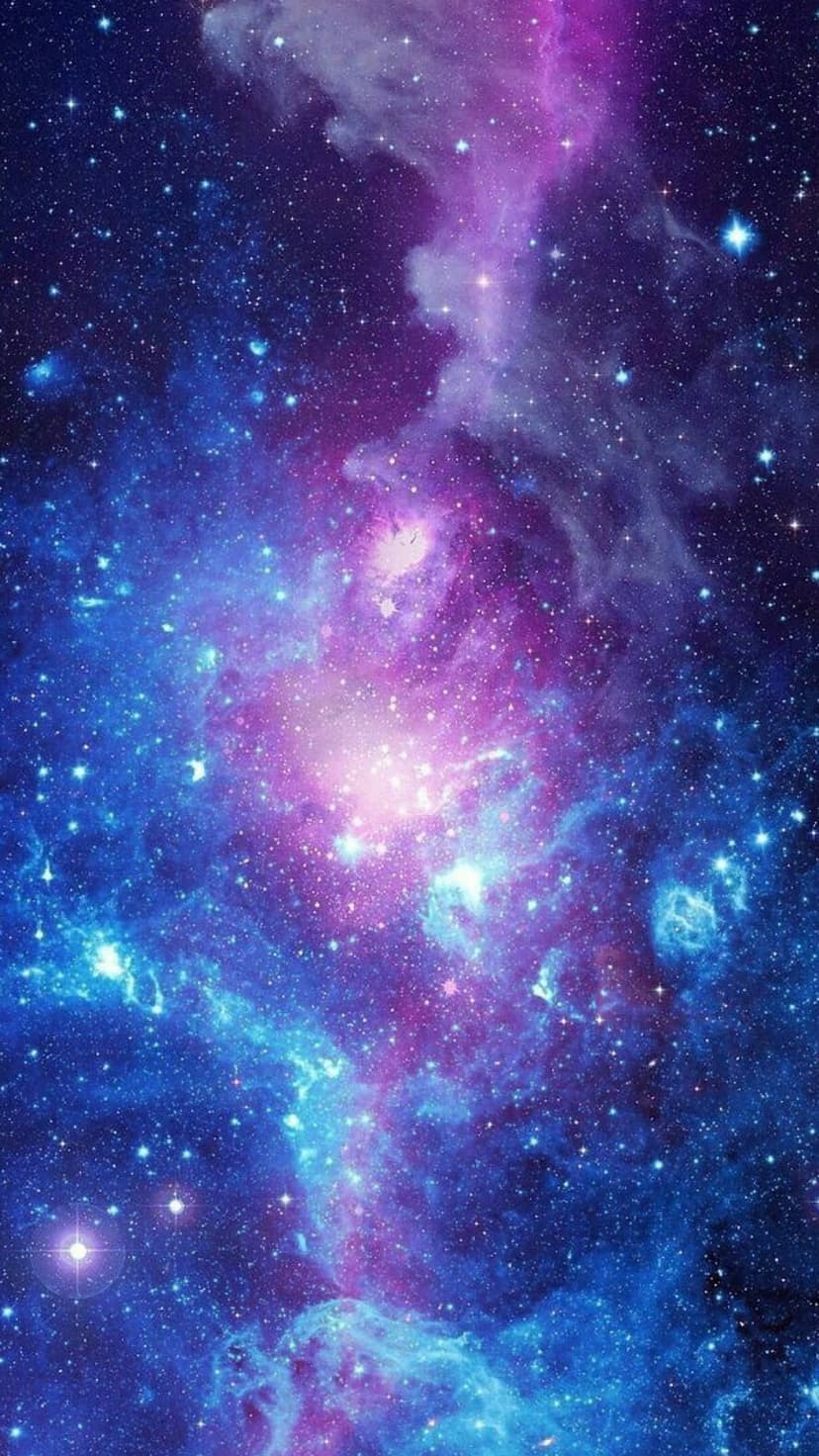 Radiant violet nebula clouds and white star clusters swirl through a deep blue cosmic void in high resolution.