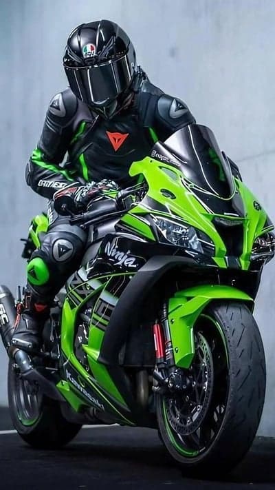 Rider on a Green and Black Kawasaki Ninja Motorcycle