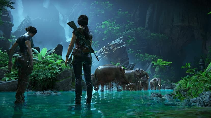 Two women stand in a turquoise pool watching a herd of elephants wade past a misty jungle waterfall.