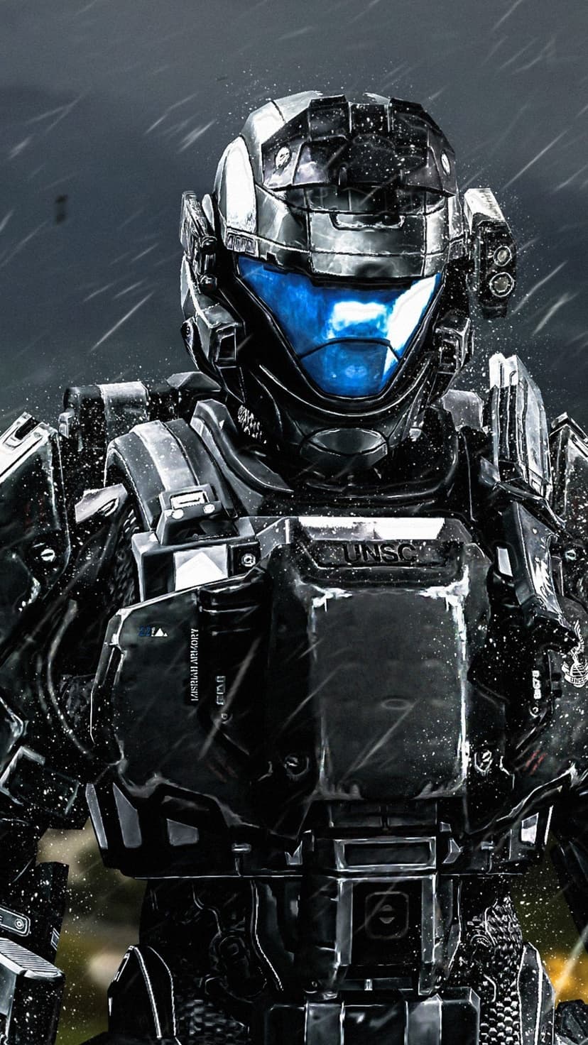 Spartan soldier in black UNSC armor with a glowing blue visor amidst falling snow in a dark environment.