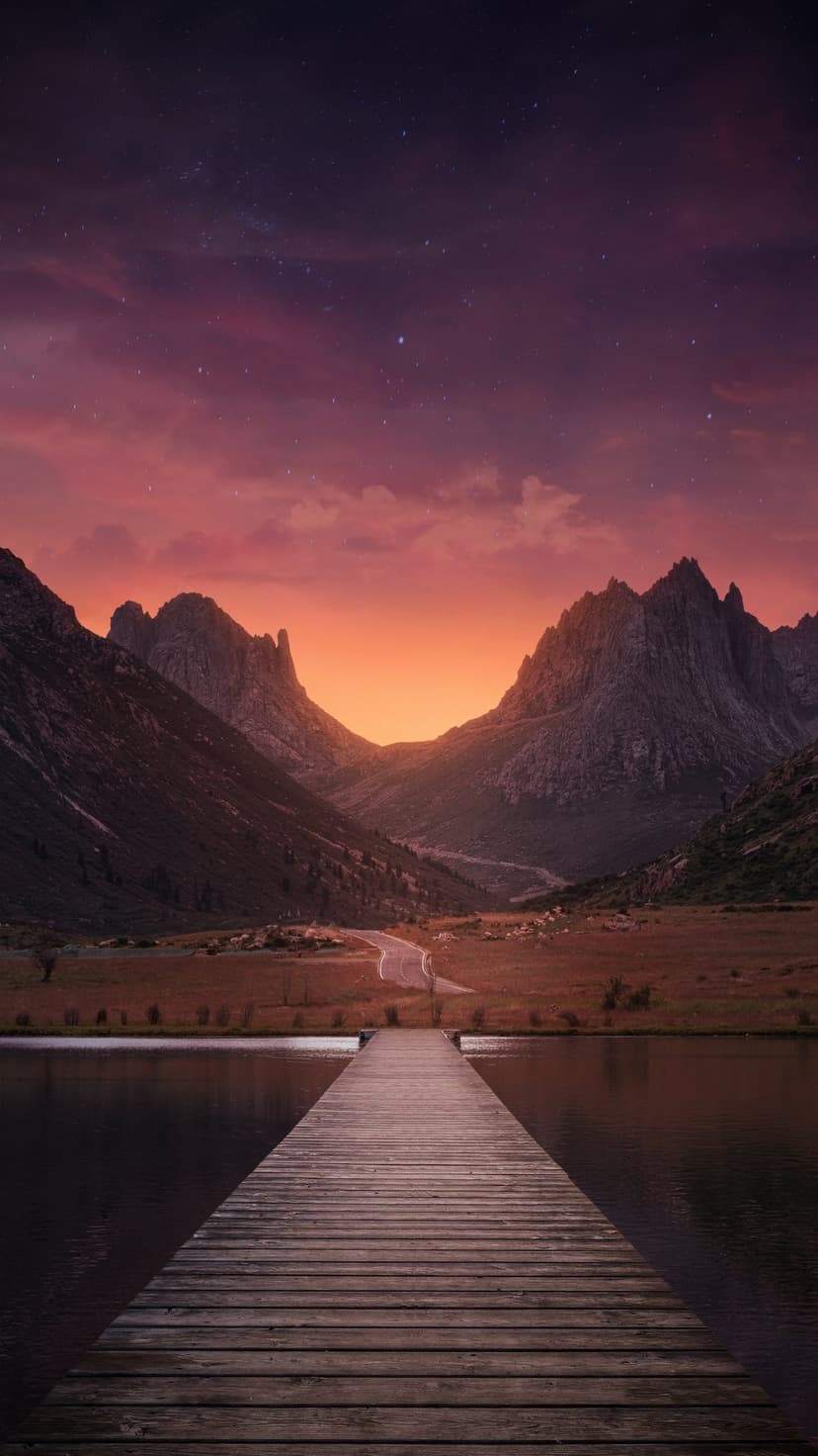 Wooden pier stretching into a calm lake toward jagged mountains under a purple and orange starlit sunset sky.