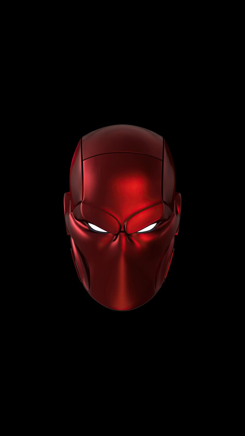 Red Hood mask with glowing white eyes and angular metallic plating centered on a solid black background.