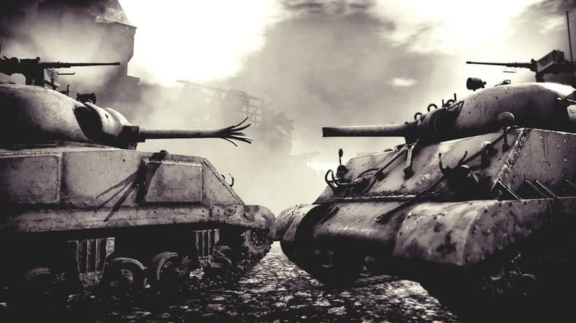 Two armored tanks face each other in a smoky, ruined urban battlefield under dramatic monochrome lighting.